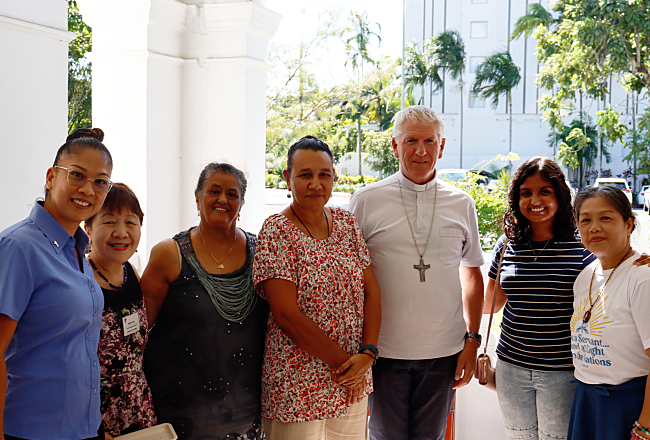 bishop-and-volunteers